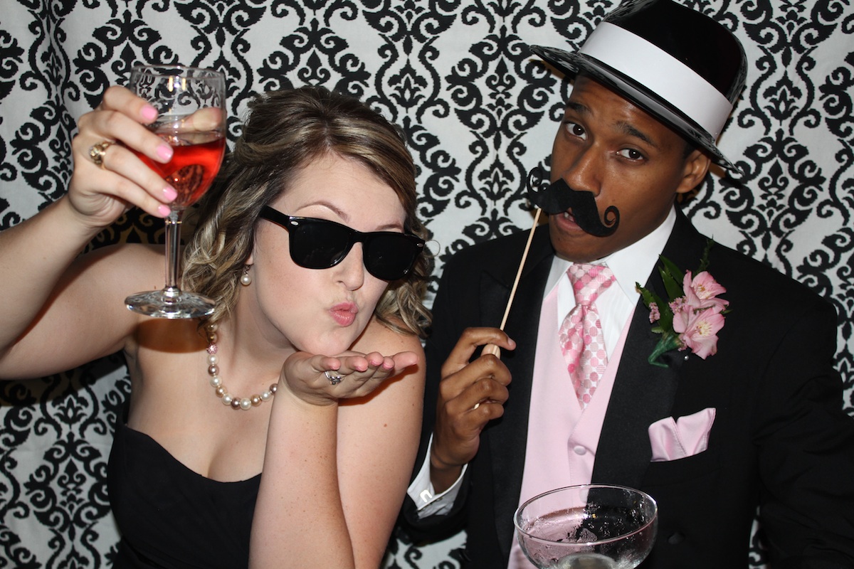 Image of a print example of the red carpet photo booth in use.